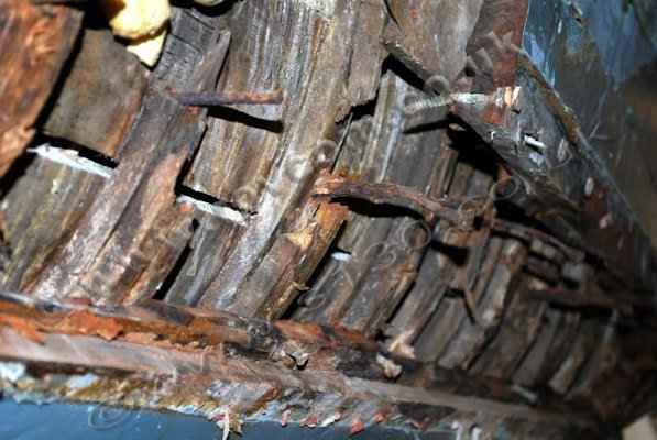 S130 - Hull planking removed to show broken, tired and friable oak timbers and corroded fastenings